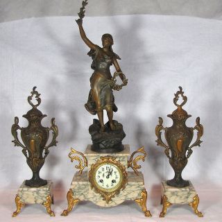 antique figural clocks