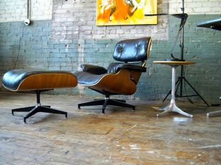 HERMAN MILLER EAMES LOUNGE CHAIR AND OTTOMAN WALNUT BLACK LEATHER