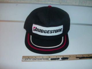 BRIDGESTONE EMBROIDERED BLACK PATCH HAT VINTAGE IN MINT NEW CONDITION