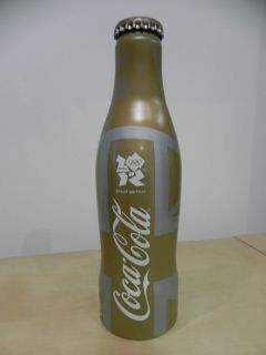 Coca Cola UK   2012 Olympics gold ALUMINIUM bottle, full. (The first 