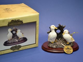 THE LEONARDO COLLECTION PAIRED WHITE DUCKLINGS & DRIFTWOOD ON PLINTH 