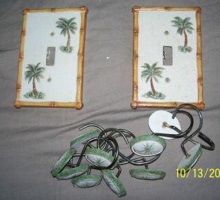 PALM TREE SHOWER CURTAIN HOOKS AND 2 LITE COVERS.