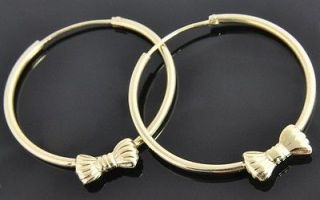   14K Yellow Gold Bow Tie Ribbon Round 1.5 Continuous Hoop Earrings