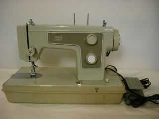 VINTAGE  KENMORE PORTABLE SEWING MACHINE MODEL #148.12191 WITH 