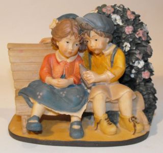Roman Lisi Martin Dolfi Boy & Girl on Bench Figurine.