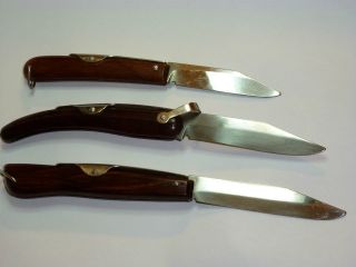   UNUSED OKAPI FOLDING KNIVES WOODEN HANDLES MADE IN GERMANY NEW