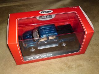 43 Diecast Toyota Hilux Double Cabin Blue RIMS