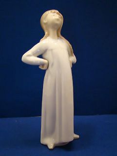Lladro Girl with hands Akimbo, Retired 2000