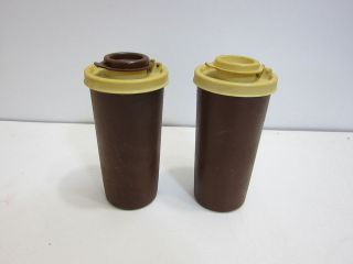 VINTAGE TUPPERWARE BROWN SALT AND PEPPER SHAKERS WITH LIDS S&P ALMOND