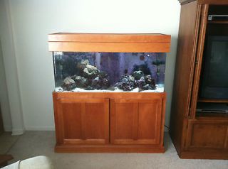 70 gallon fish tank with lights, pumps and nice cabinet