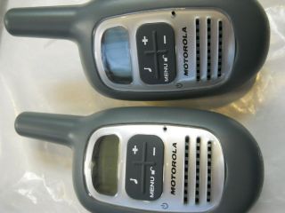 Motorola Set of Walkie Talkies. Includes a Charger, an AC Adaptor. JM