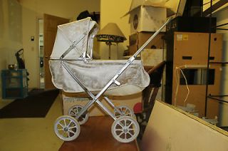   listed South Bend Toy Manufacturing Co. Doll Coach Stroller (antique