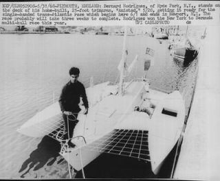 1968 Bernard Rodriguez stands on deck of his home built trimaran Wire 