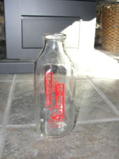 Bridgeman clear glass milk bottle, One Quart, old, advertising, capped