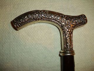 VINTAGE WALKING STICK CANE WITH STERLING SILVER REPOUSSE FLOWER HANDLE 