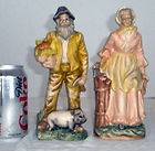 PAIR OF SIGNED OLD FARMERS LADY MAN FIGURINES PIG AXE