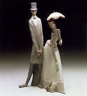 lladro piece 4563 couple with parasol from spain time left