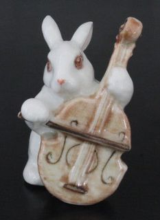 figurine animal ceramic statue white rabbit playing bass from thailand