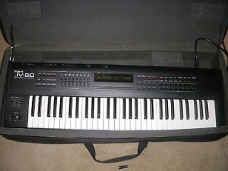 roland jv 80 electronic key board with case time left