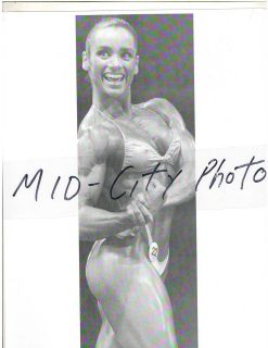 Gladys Portugues Posing at Ms Olympia Contest Female Bodybuilding 