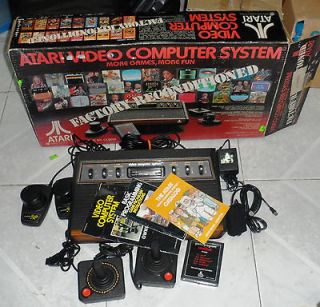 Atari 2600 VIDEO COMPUTER SYSTEM FACTORY RECONDITIONED Woodgrain 