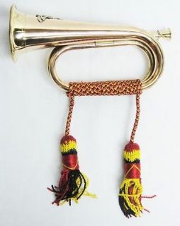 brass and copper boy scout military bugle with red tassel