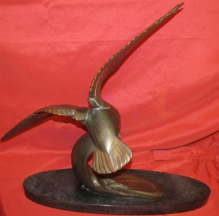 Superbe bronze art déco 1930 hauteur 56 cm envergure des ailes 65 cm 