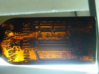 Antique Bottle Warners safe Nervine, deep Amber color very nice ~Rare 