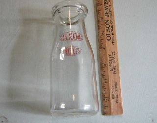 vintage glass milk bottle red silk screen dixon on two sides dixon 