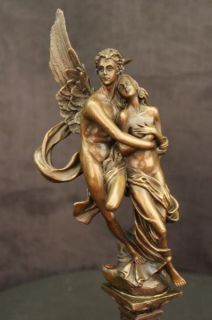 nude male angel carries a nude girl and in his arms.