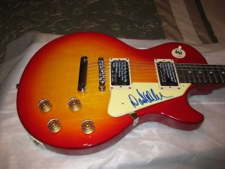 David Allan COE Signed Guitar Proof