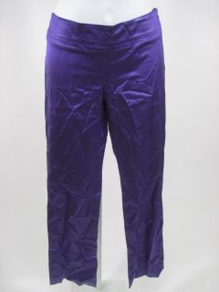 you are bidding on a anna argiolera purple slacks pants in a size 2 