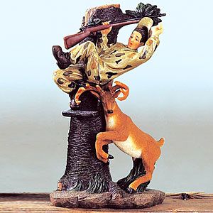   Funny scene includeS a buck ramming a hunter up a tree. Polyresin, 6