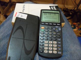 Texas Instruments TI 83 Plus Graphic Calculator with Manual