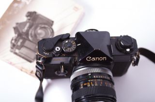Canon F 1 35mm SLR Film Camera & 50mm f11.4 prime len, zoom lens, and 