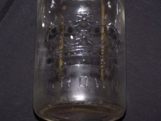   EMBOSSED ONE QUART CANNING JAR W/ GLASS EMBOSSED TOP AND ZINC RING