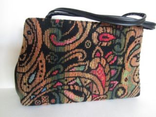 This is a really nice extra large capet frame purse from the 1950s or 