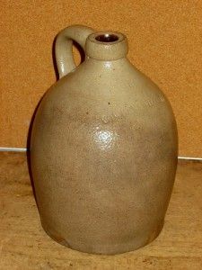  SMALL 19TH C STONEWARE OVOID SHAPED HANDLED JUG SIGNED COWDEN & WILCOX