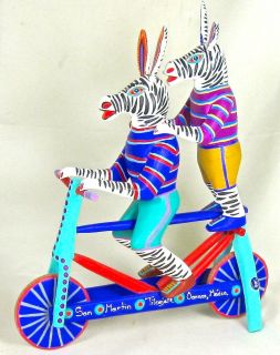 OAXACAN wood carving ZEBRA riding bicycle BY MARTIN MELCHOR OAXACA