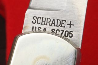 Schrade Scrimshaw Bear SC 705 Folding Lockback Hunting Knife and