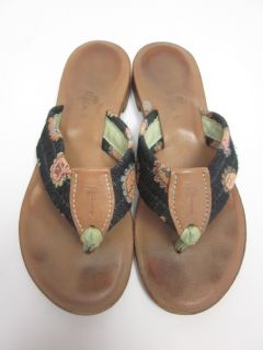 you are bidding on a pair of eliza b navy floral print thong sandals