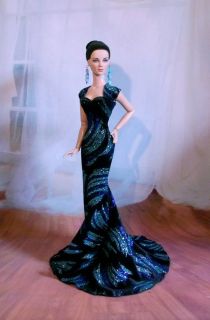 this gown is made from designer black velvet with a design in
