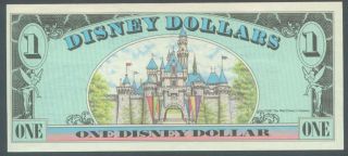 are bidding on a mint series 1987 disneyland dollar the picture shown