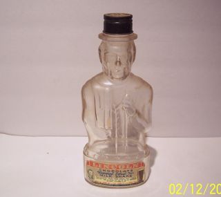  ABRAHAM LINCOLN CHOCOLATE FLAVORED SYRUP MILK SHAKE GLASS BANK BOTTLE