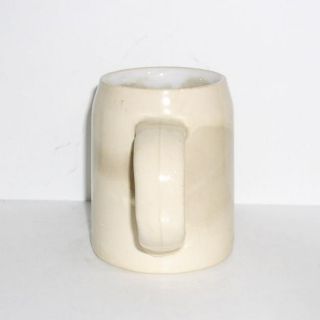 Mug is in good condition. Has overall crazing and staining, height is