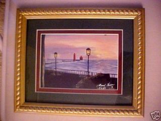 Grand Haven Lighthouse by Della Kennedy Framed