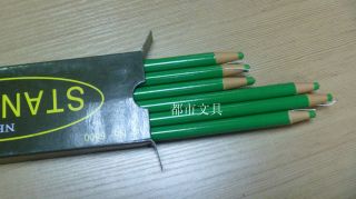 Paper wrapped marker (grease China marking pencil) with thick, waxy