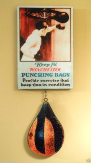  1920s Winchester Punching Bags Sign with Die Cut Punching Bag