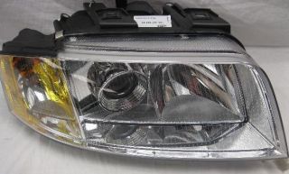Hella W01331737107HEL Headlight Assembly Left Volkswagen Passat 2001