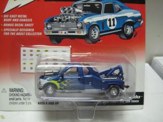 JOHNNY LIGHTNING REBEL RODS TOW NADO 2000 FORD F 550 TOW TRUCK MINT ON CARD  